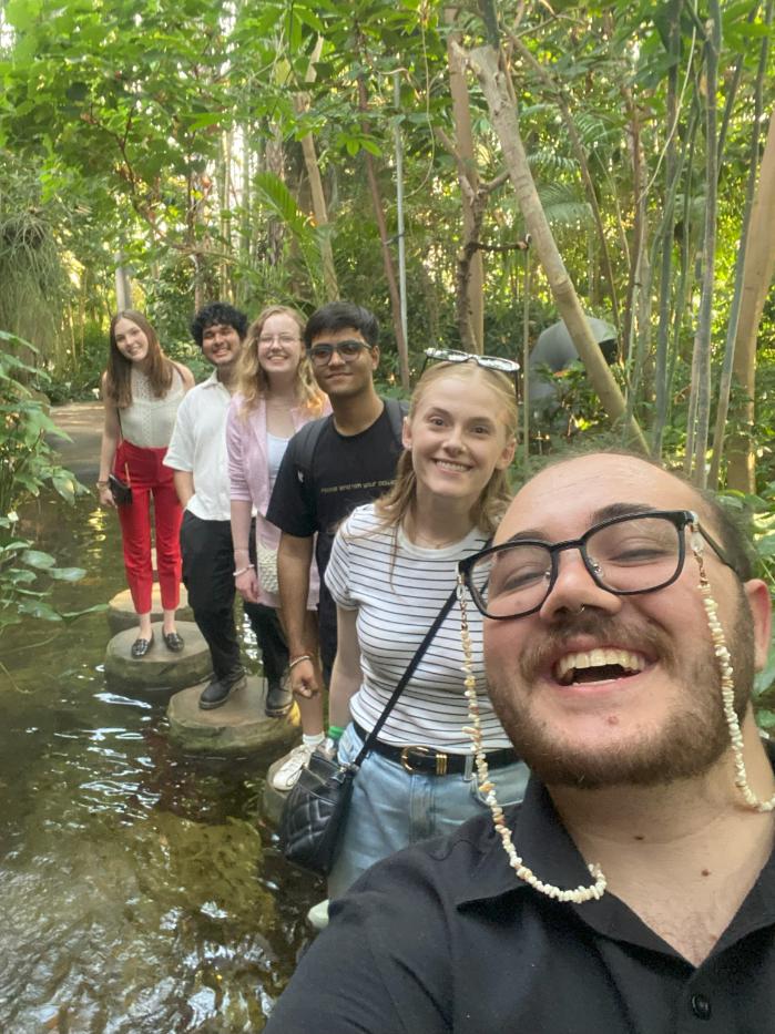 A group of students in a botanical garden.